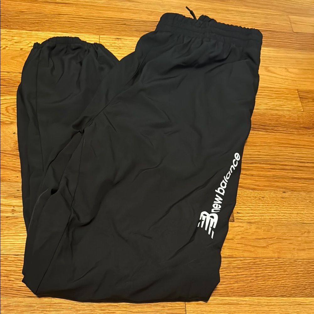 New Balance Black Athletic Pants
Used 
Wind pant material